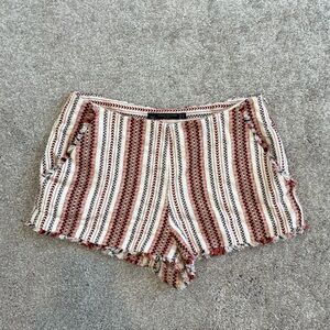 Zara grunge booty shorts in orange, black, and cream